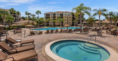 Relax poolside with tropical vacation vibes and plenty of space to unwind.