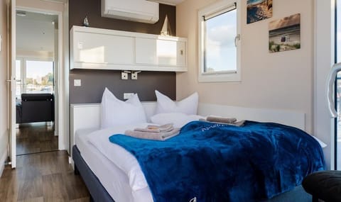 Bedroom with modern furniture and daylight