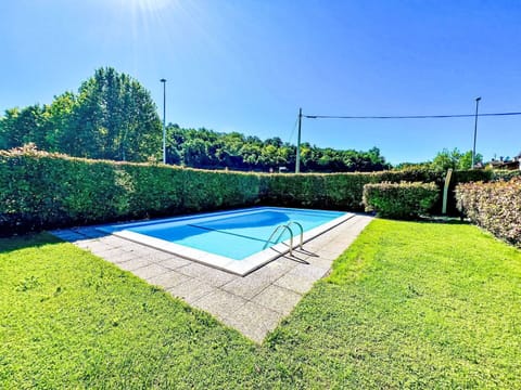 Blue, Swimming Pool, Composite Material, Garden, Shade, Landscaping, Resort, Lawn, Water Feature, Hedge
