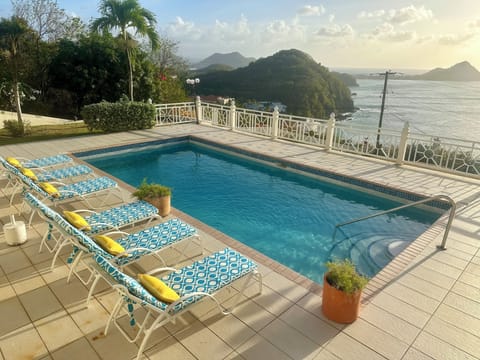 Take in the view of Pigeon Island and the Caribbean Sea from these loungers.