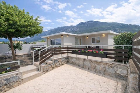 Welcoming Exterior Entrance with Private Terrace