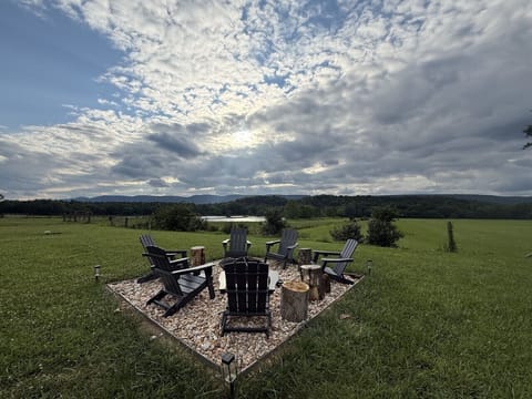 Gather beneath wide-open skies around the fire pit, surrounded by mountain views, open fields, and peaceful silence. It`s the perfect place to roast marshmallows, share stories, or simply watch the stars emerge