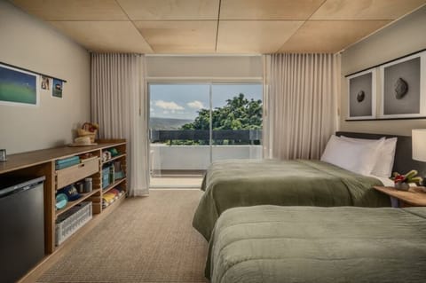Stretch out comfortably with two beds and relaxing balcony views.