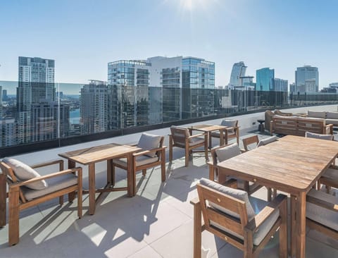 Rooftop terrace with stunning Miami skyline views — perfect for al fresco dining