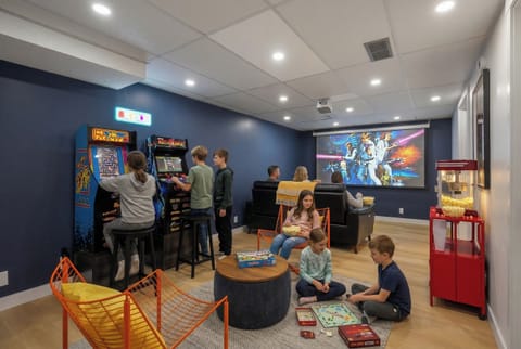 Movie night, arcade battles, board games on the floor. The dedicated games room & home theater keep everyone entertained for hours.