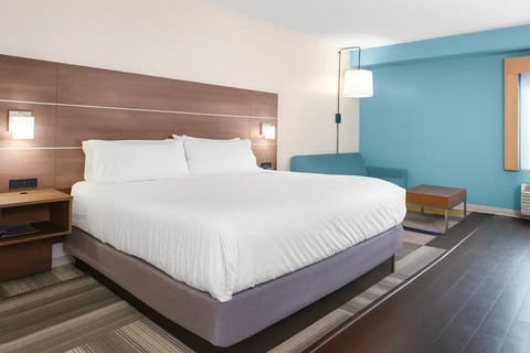 Sink into a serene king bed for deep, restful sleep.