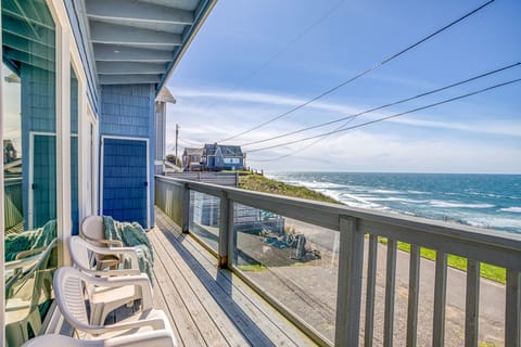 Breathtaking oceanfront balcony with comfortable seating where you can watch waves crash while sipping morning coffee or enjoying coastal sunsets.