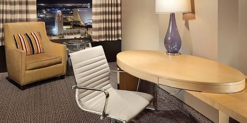 Settle in with a roomy desk and cozy lounge chair.