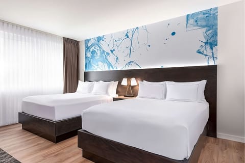 Drift off comfortably in a spacious double-bed room with glow.