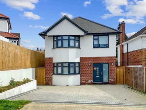 The picture of the house (2 paid parking spaces here). Contact us for rates! 