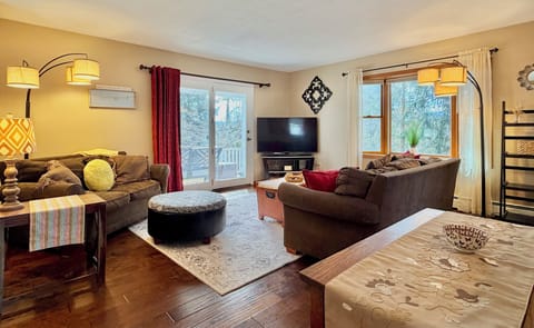 Cozy living room with comfortable seating and Smart TV