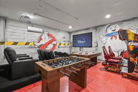 Enjoy a private game room featuring foosball, air hockey, arcade racers, and a big-screen TV, an exciting hangout for all ages to play, unwind, and create unforgettable memories together.