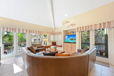The built-in media area keeps everything organized without taking away from the open feel of the space.