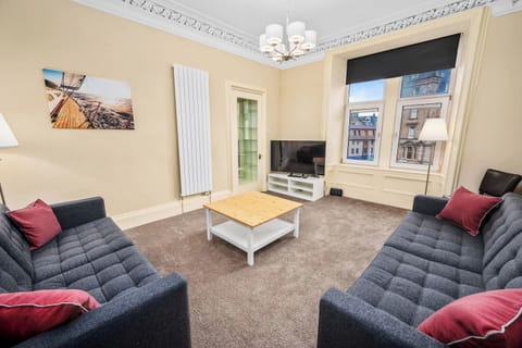 Large comfortable living room with sofa bed.