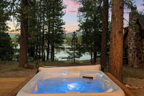 Lakefront Hot Tub Wellness Retreat - Outdoor Wellness Retreat Lakefront - Expansive deck with hot tub, sauna, lakefront views, fire pit, and comfy seating areas.