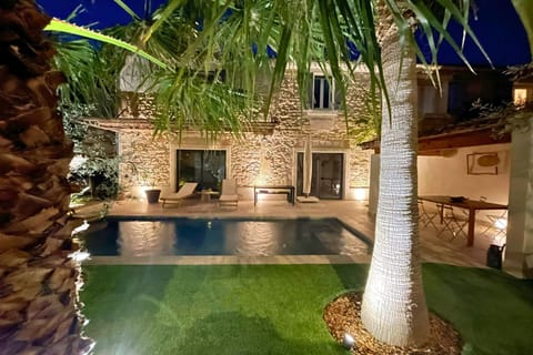 The house lit at night