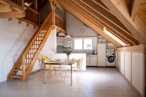 Bright dining area with warm wooden interior