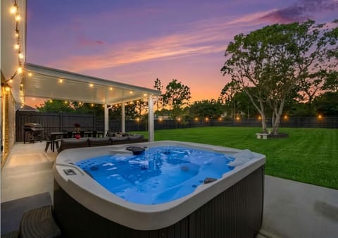  Backyard Oasis w/ Hot Tub, Covered Patio & String Lights – Perfect for Relaxing
