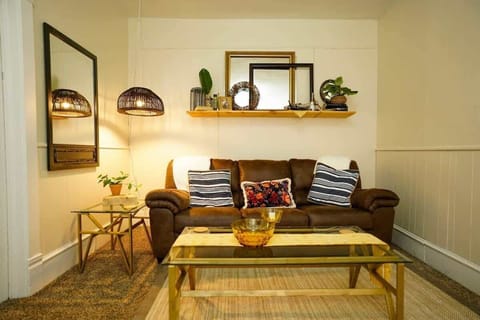 Cozy living room sofa with retro decor