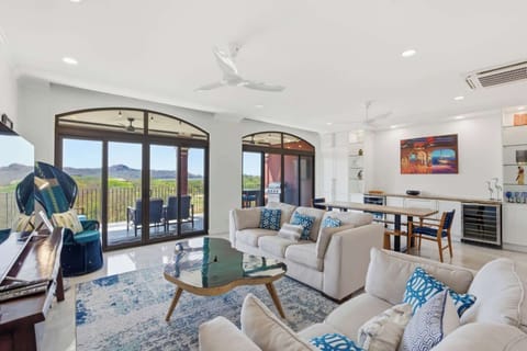 Relax and enjoy the view from your spacious living room, where comfort meets elegance.