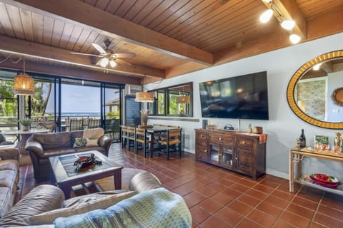 Spacious living room with cozy seating and scenic views