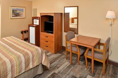 Settle in with convenient mini-fridge, microwave, and dining nook.