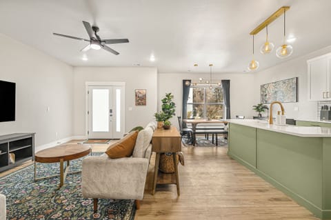Main level living room, kitchen and dining area.