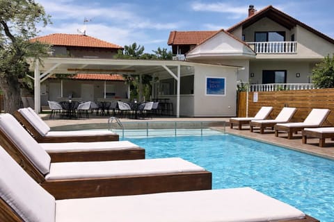 Another view of the pool highlighting its size and clean layout, with clear water and a well-kept surrounding area.
