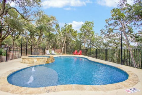 Dive into crystal-clear waters in the private oasis