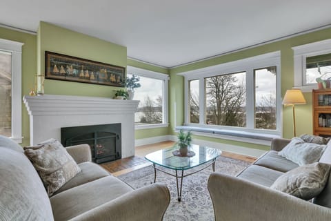 Amazing view of the Puget Sound and Olympic Mountains from our beautiful living room.