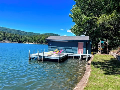 Boathouse Deck - Sunny deck with expansive view of Lake and Mountains