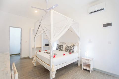 Refresh in a cool, airy room designed for deep sleep.