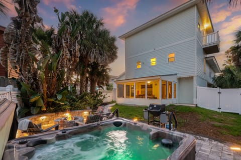 Soak in the hot tub under the stars by the fire pit.