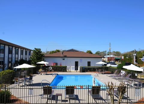 Gather outdoors for sunny swims and shaded table breaks