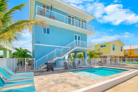 View of the pool and back of the home