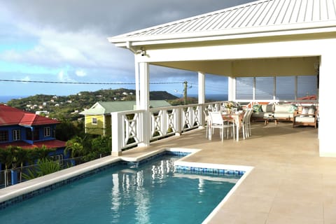 Large deck with pool and covered terrace