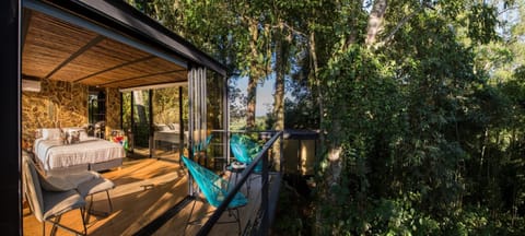 Wake up to birdsong on a private forest-view balcony.