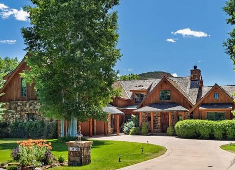 Front exterior ample driveway space, three car garage, separate mudroom entry