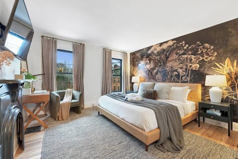 Comfortable king bed in primary suite. 