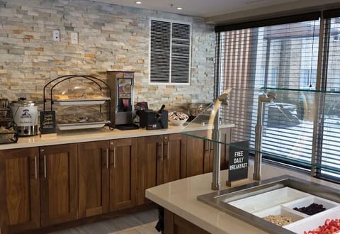 Free daily breakfast included for your stay - featuring fresh daily selections!