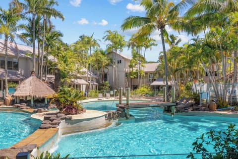 Relax beside the heated lagoon style swimming pool