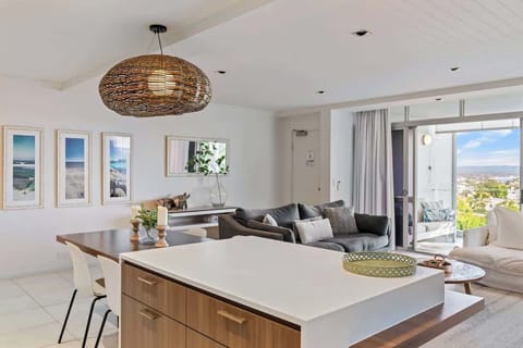 Lovely bright and airy open plan living space that flows onto the balcony with beautiful views across Noosa. You'll enjoy some magical sunsets from here!