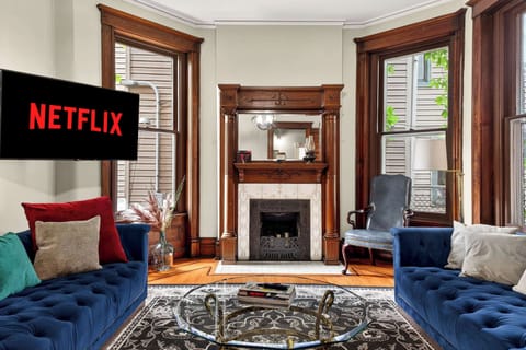 Living Room: Relax in this cozy living room featuring a comfortable sofa, soft lighting, and a warm, inviting atmosphere. Perfect for unwinding after a long day, enjoying movie nights, or simply lounging in comfort.