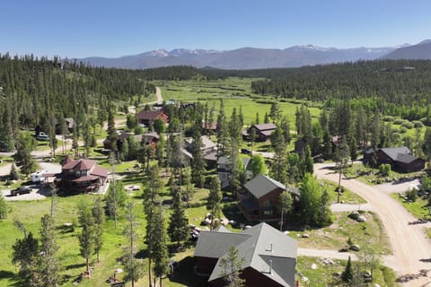 21 GCR 4435 is in a mountain resort community nestled in pristine wilderness with snow-capped peaks and lush forests creating a perfect alpine getaway setting.