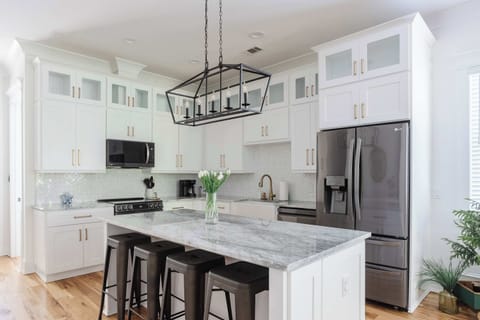 A beautifully designed modern kitchen with stylish finishes and a bright, open layout!