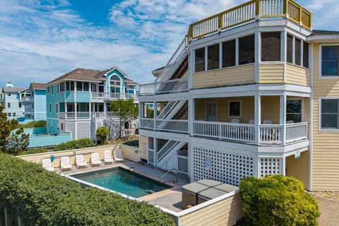Heron Landing a coastal retreat inside Corolla Light Resort, sleeps up to 16 guests with private pool and hot tub: Managed by Rather Be Properties