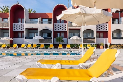 Stretch out on bright loungers and savor warm afternoon sun.