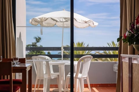 Sip morning coffee on the balcony with sea breezes.