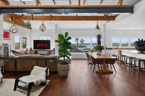 Open plan living and dining area with harbour views.