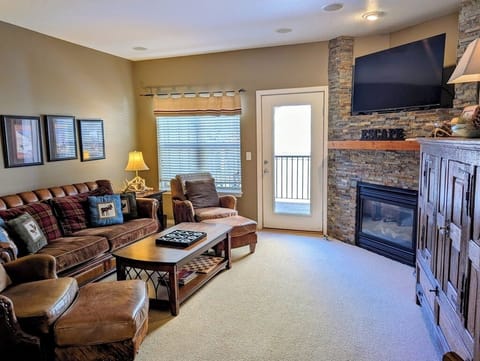 Unwind in the cozy living room with plenty of seating and Smart TV